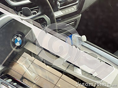 View inside electric BMW car with leather cover steering wheel Editorial Stock Photo