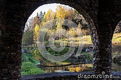 View from inside the stone rotunda on the bridge thrown over the river Stock Photo