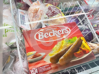 View inside supermarket store fridge of red package with frozen Lekkers Van Editorial Stock Photo