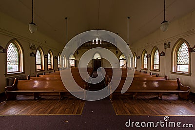 Pews & Stained Glass Windows - Derelict Chapel - Abandoned Cresson Prison / Sanatorium - Pennsylvania Stock Photo