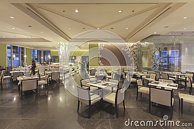 View Interior of a hotel restaurant at Miracle Grand Convention Editorial Stock Photo