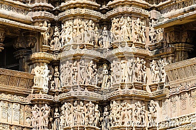 Intricate sculptures carved on the facade of Khajuraho Hindu temples India Stock Photo