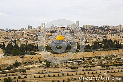 A view of the Islamic Dome of the Rock mosque from the ancient Mount of Olives situated to the East of the old city of Jerusalem Stock Photo