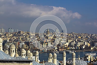 View on Istanbul acros bosphorus. Towers and domes, strait with sailing ships and colorful city Stock Photo