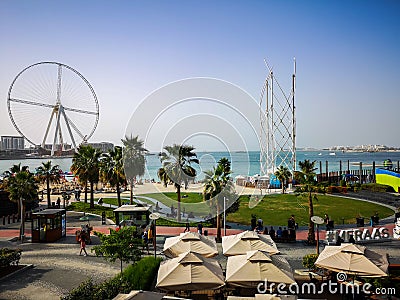 View of JBR beach with the Ain Dubai ferris wheel in Bluewaters island, a new future tourist attraction in Dubai Editorial Stock Photo