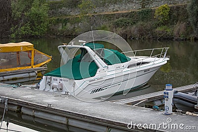 View of a jet boats on the Pinhao city marina with Douro river on background Editorial Stock Photo