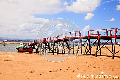 View of jetty in the El Puntal beach Stock Photo