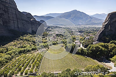 View on Kalabaka town from miraculous monastery on rock formation, Meteora, Greece, beside the Pindos Mountains Stock Photo