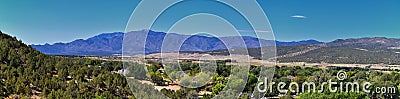 View of Kanarraville valley and mountain range from hiking trail to Waterfalls in Kanarra Creek Canyon by Zion National Park, Utah Stock Photo