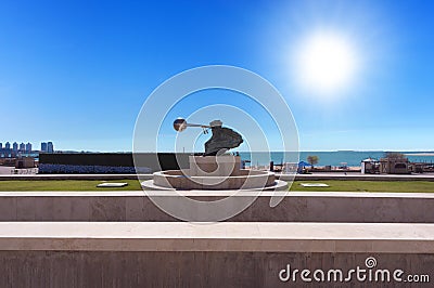 View of Katara Cultural Village in Doha. In the foreground a sculpture of Force of nature Editorial Stock Photo