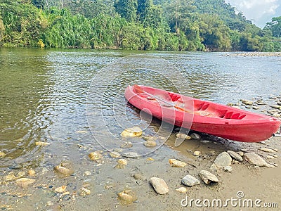 View of a kayak parked on the river Stock Photo