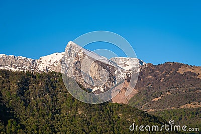 View from Kobarid to summit of mountain Krn in Slovenia Stock Photo