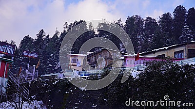 View of kufri in Himachal Pradesh with snow fall and trees image Stock Photo