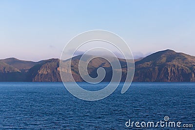 View on a Kunashir island with volcano Tyatya from the sea. Stock Photo