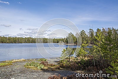 View of Lake Meiko area in spring, rocks, pine trees and lake Stock Photo