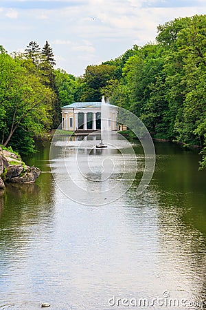 View of lake with Snake Fountain and Flora Pavilion in Sofiyivka park in Uman, Ukraine Stock Photo