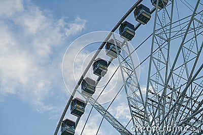 The view landmark before a summer sunset - touristic wheel with amazing view over the city Editorial Stock Photo