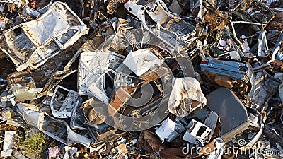 A view of a large pile of scrap metal at a junkyard or recycling plant Stock Photo