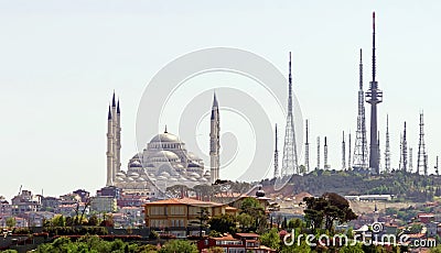 View of the largest mosque in Turkey, Grand CamlÄ±ca Mosque, and the CamlÄ±ca TRT Television Tower Editorial Stock Photo