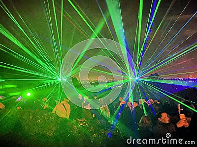 A view of a Laser show at Alexandra Palace in London Editorial Stock Photo