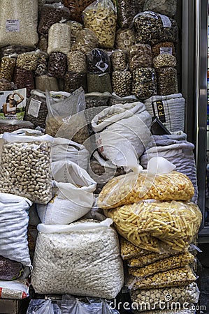 View of a lavish stall with nuts, pasta and spices Stock Photo