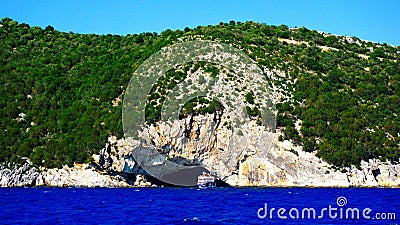 Cruise Ship. View of Lefkada, a green Ionian Greek Island, from a day cruise boat leaving Nidri Port, Lefkada island, Greece Editorial Stock Photo