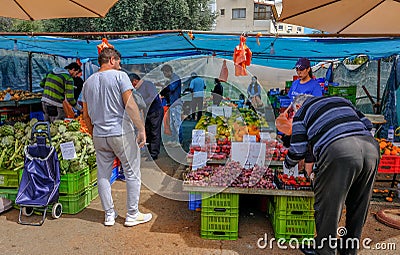 View of Limassol fruit and vegetable market with shoppers choosing their fruit and vegetables Editorial Stock Photo
