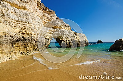 View of limestone cliffs of the Three Castles beach in Portimao, District Faro, Algarve, Southern Portugal Stock Photo