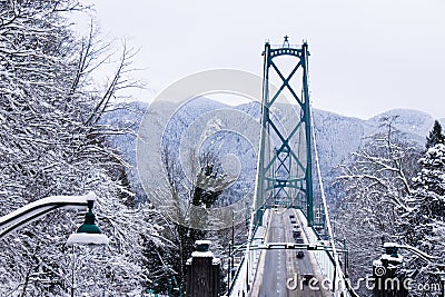 A View of Lions Gate Bridge covered in snow in Vancouver. Editorial Stock Photo