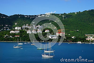 View of Long Bay, St. Thomas island, US Virgin Islands from water with multiple yachts and boats on the foreground Stock Photo