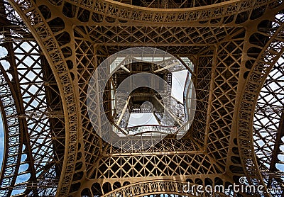 View Looking straight up from the base of the Eiffel Tower in Paris Editorial Stock Photo