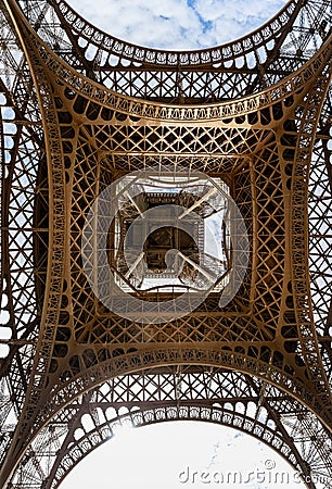 View Looking straight up from the base of the Eiffel Tower in Paris Editorial Stock Photo