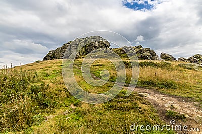 A view looking up to the summit of the Almscliffe crag in Yorkshire, UK Stock Photo