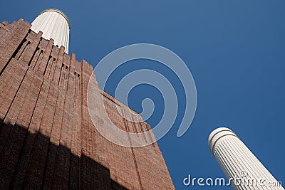 Chimneys at Battersea Power Station, renovated interwar building, now a mixed use retail and residential scheme. Stock Photo