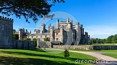 View of Lowther Castle, a picturesque historic building situated in midst of lush, verdant nature Stock Photo