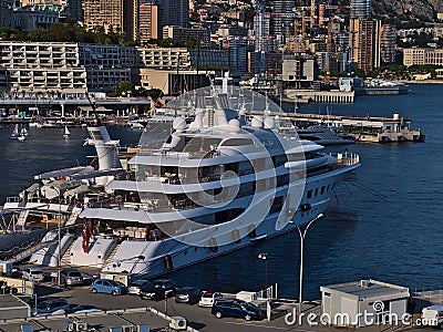 View of luxury megayacht Quantum Blue, owned by Russian businessman Sergey Galitsky, moored in the harbor of Monaco. Editorial Stock Photo