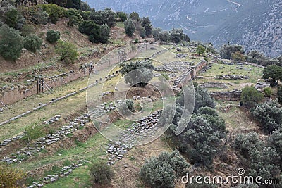 View of the main monuments of Greece. Ruins of ancient Delphi. Oracle of Delphi. Mount Parnassus. Stock Photo