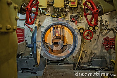 View of the main passage inside the submarine, appliances, hatches, pipelines Editorial Stock Photo