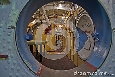 View of the main passage inside the submarine, appliances, hatches, pipelines Editorial Stock Photo