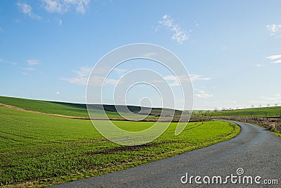 View of the main road leading to vineyards and farms in the Svatoborice region of Moravian Tuscany during a sunny autumn day in Stock Photo