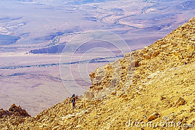 View of Makhtesh crater Ramon with visitors hiking Editorial Stock Photo