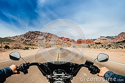 View of a man driving a motorcycle on a road Stock Photo