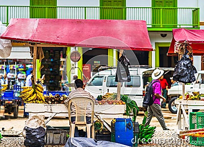 View on market trader selling food in the village Jerico of Colombia Editorial Stock Photo