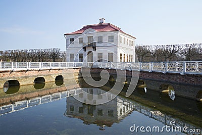 View of the Marly Palace from the ponds, April day. Peterhof Editorial Stock Photo