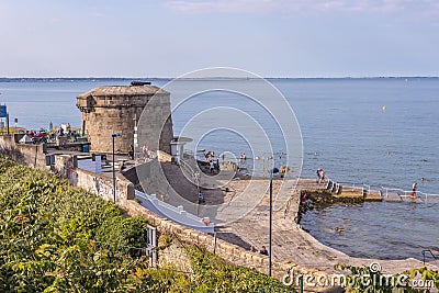 View of Martello Tower and the sea in Dublin under the beautiful cloudy sky Editorial Stock Photo