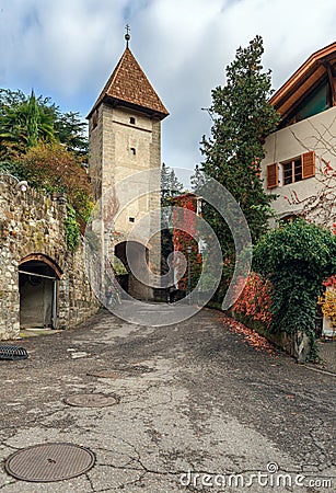 View of the medieval Passiria Gate with watchtower, first documented in 1349. Town of Merano, Italy Stock Photo