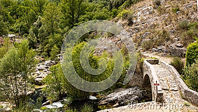 Sant Angelo in Fasanella Italy. View of the medieval stone humpback bridge over the sources of Auso. Ancient communication route Stock Photo
