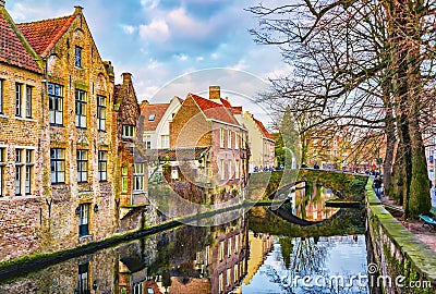 View from Meestraat bridge on Groenerei canal, Bruges, Belgium Editorial Stock Photo