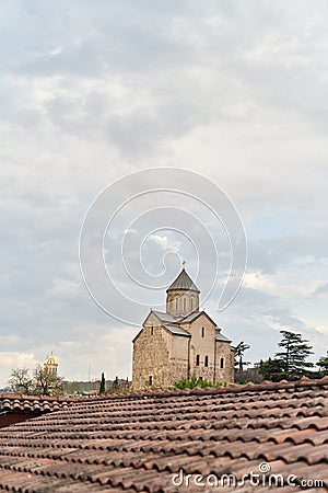 View of Metekhi Church in in old Tbilisi. Historical Orthodox Temple of Georgia. Stock Photo