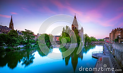 View of Metz with Temple Neuf reflected in the Moselle River, Lorraine. Stock Photo